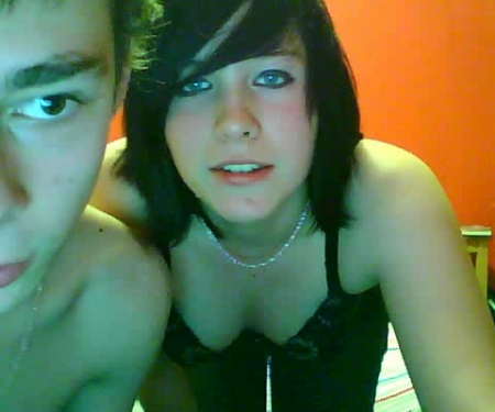 Young couple, teenager oral fan near webcam Young couple, teenager oral fan near webcam